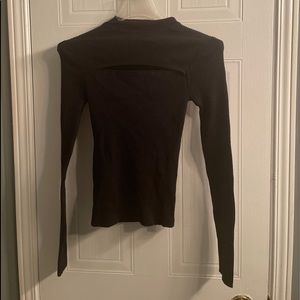 Black mock neck/turtleneck shirt.